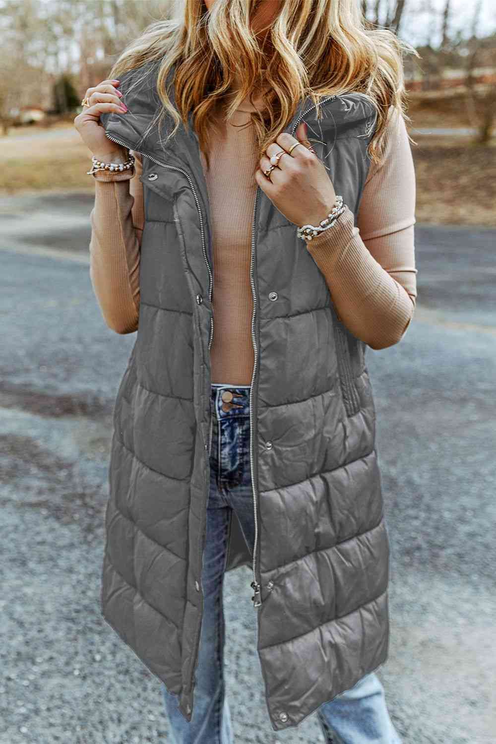 Long sleeveless down vest on sale